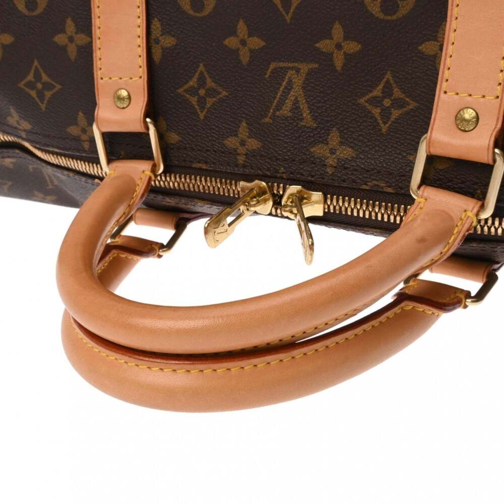 LOUIS VUITTON Brown Monogram Canvas Keepall 60 Boston Bag - Picture 4 of 11